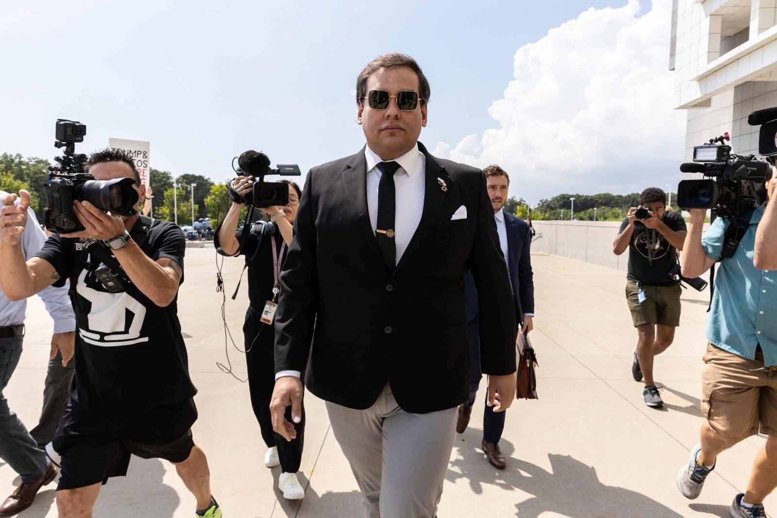 George Santos insists that he has "accepted full responsibility" for crimes days before the sentence